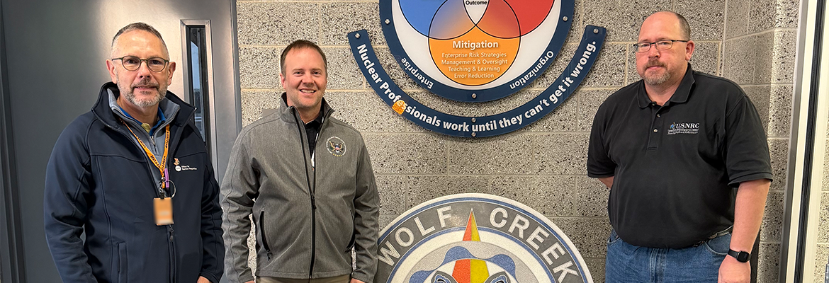 The Wolf Creek nuclear plant’s resident inspectors Cody Sigel (center) and Chris Hendersen (right) are joined by David Prescott, left, from Wolf Creek’s sister plant in the U.K., for an information exchange visit during the plant’s refueling outage.